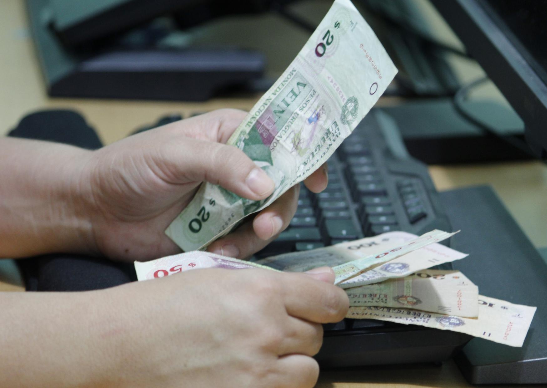 Desinflación, desdolarización y remonetización